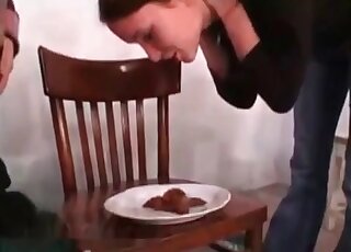 Adorable redhead is about to try her first scat dinner
