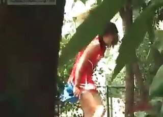 Following a cheerleader while she is pooping